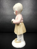 Vintage Porcelain Mad Girl Figure 5 1/4" Signed G. A. 617 with Crown Stamp, Child holding a Cup and Spoon, Pink Jacket, Hat Cap